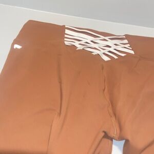 Ladies Burnt orange Fabletics Power hold Leggings with White corset design XL